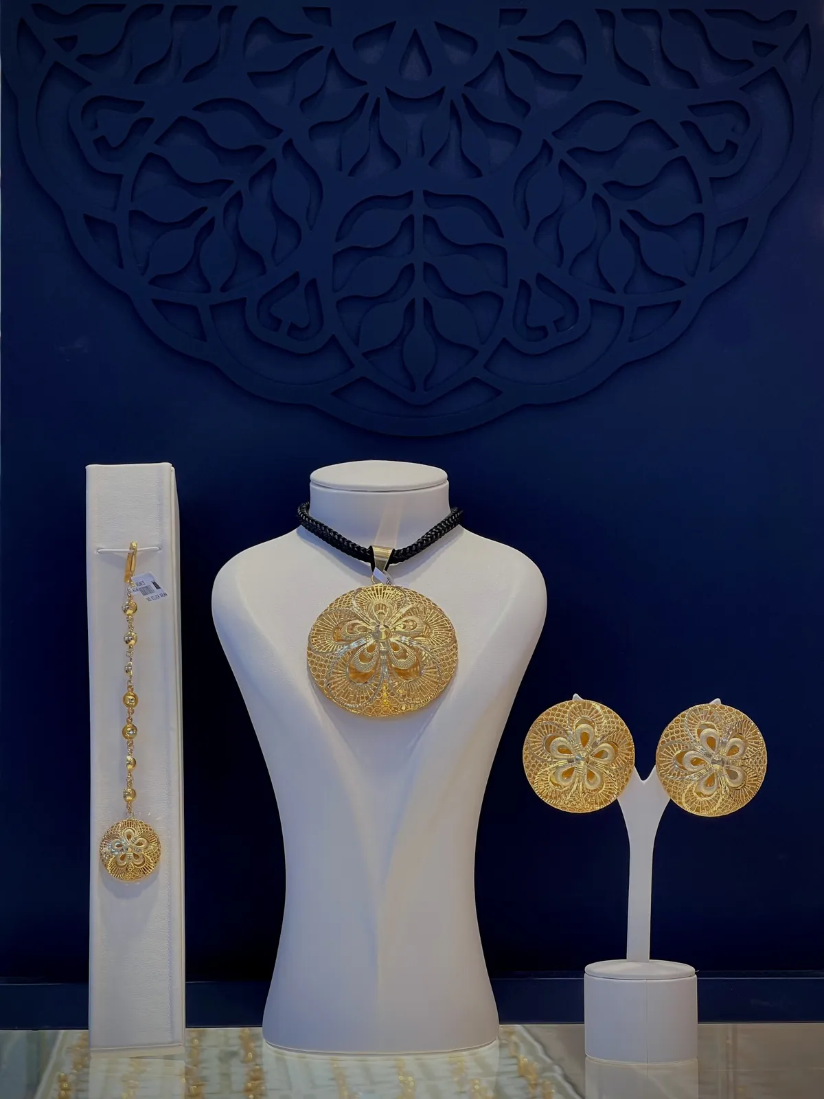 Bold 21K gold statement pendant set in our Gold Souk showroom